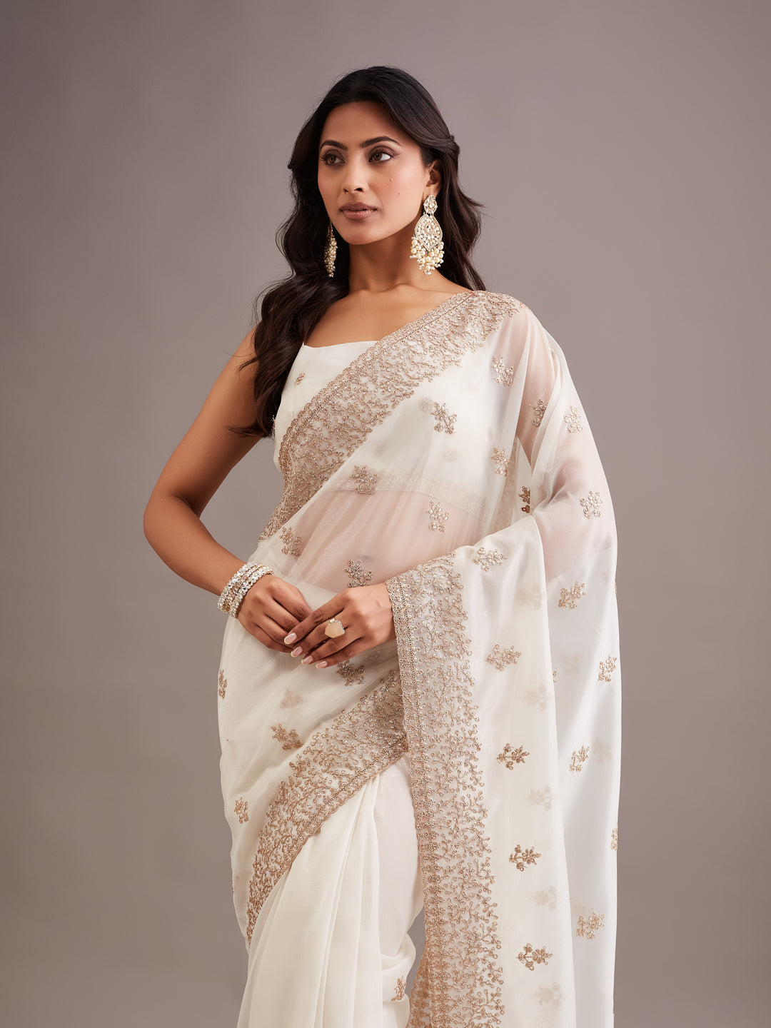 KASEE Women's white Super Net Saree with Gold Zari Buti and Heavy Embroidered Border