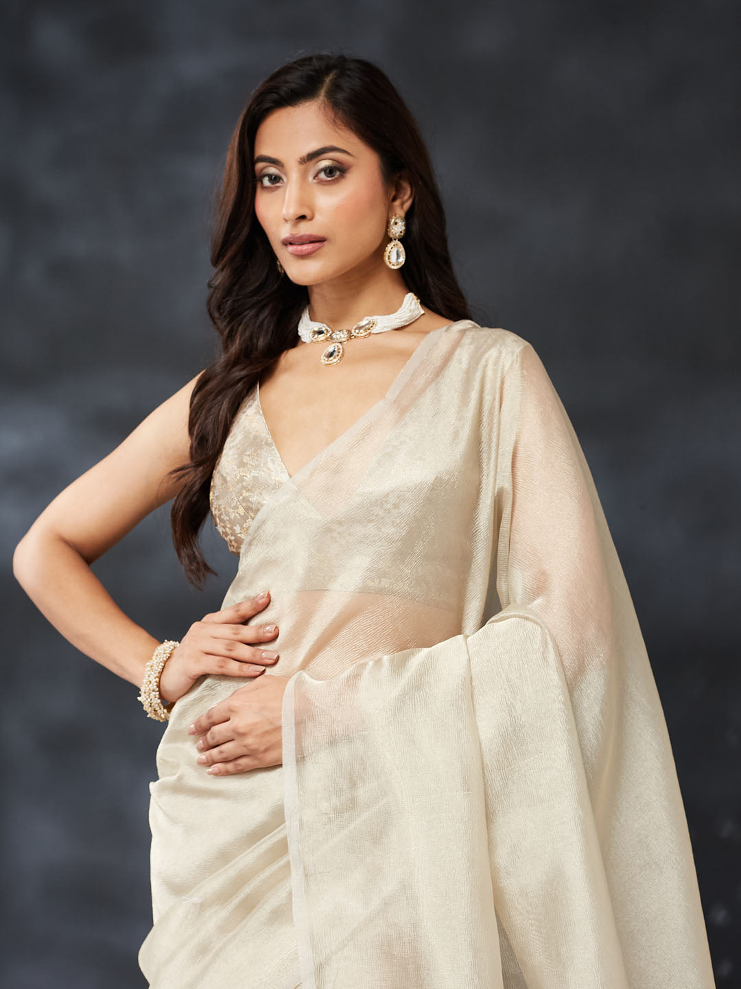 KASEE Women's Elegant Cream Saree with Shimmer Finish & Solid Draped Design